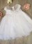 Robe de baptême bébé fille Méllonie avec paquerette